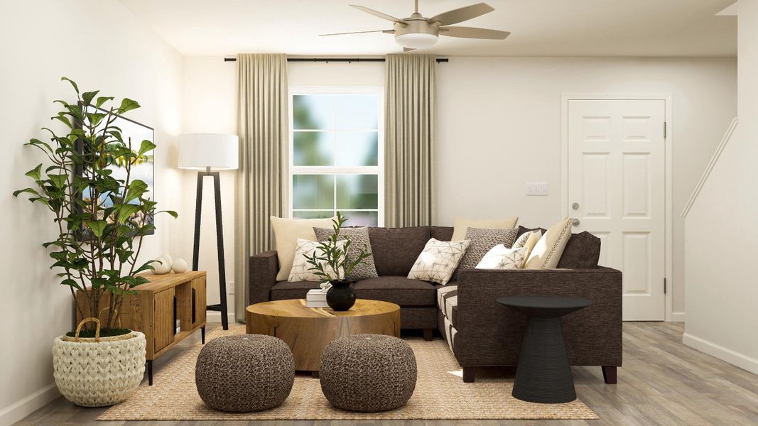 A living room with a couch and a table.