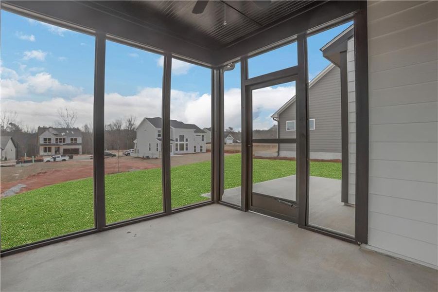 Exterior details and patio area of a home in Twin Lakes, Hoschton (Image 26).