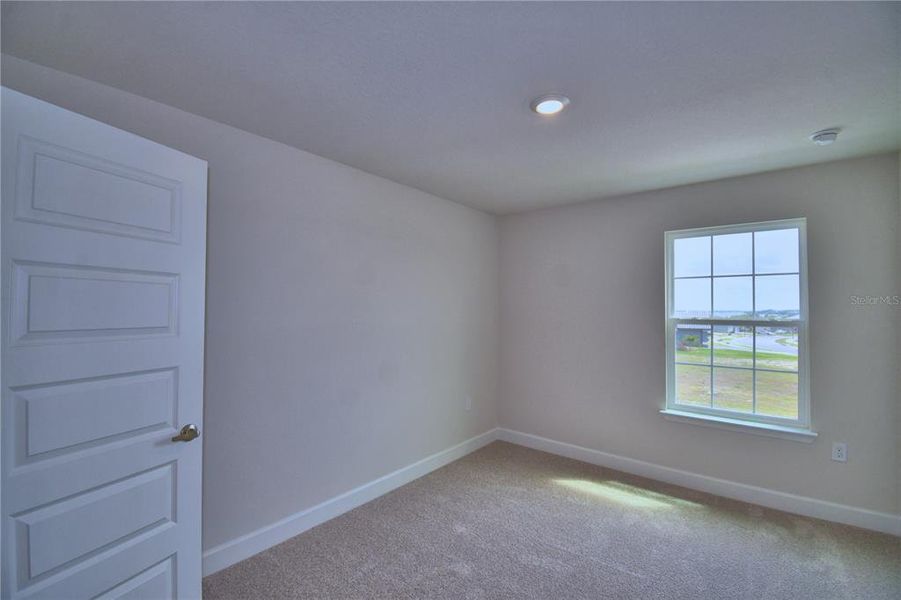 Spacious, unfurnished interior of a new home in Lake Juliana Estates, Auburndale (Image 29).