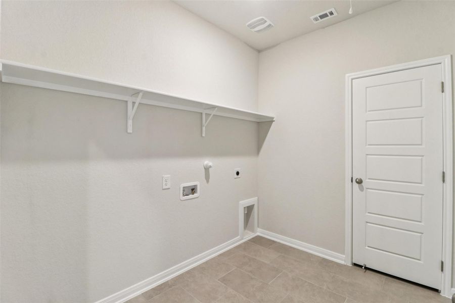 Photo is not of the actual home, but is an inspirational photo of builder’s model home and may depict options, furnishings, and/or decorator features that are not included