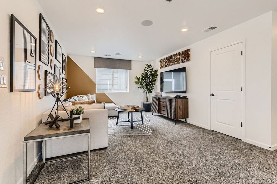 Representative furnished interior of a home built from the Ridgway by Taylor Morrison in The Fields at Looking Glass Town Collection, Parker (Image 34).