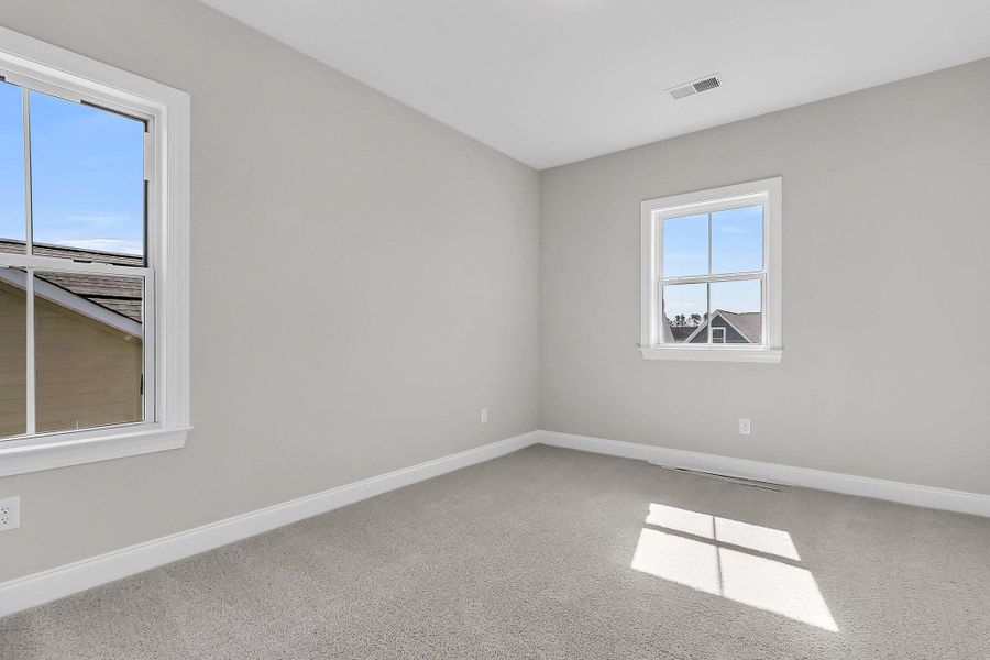 Spacious, unfurnished interior of a new home in Tidewater at Lakes of Cane Bay, Summerville (Image 15). Spacious, unfurnished interior of a new home in Tidewater at Lakes of Cane Bay, Summerville (Image 15).