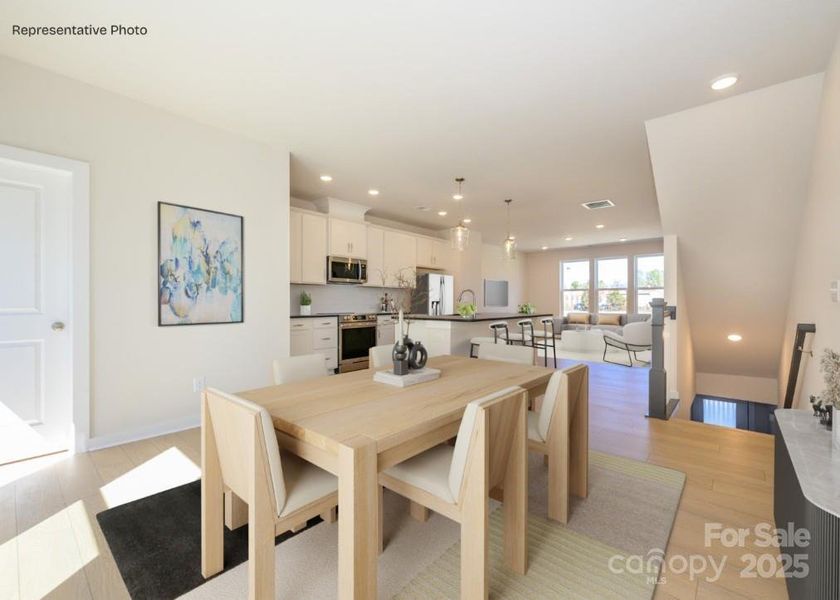 Furnished interior view inside a new home in Central Living at Craig, Charlotte (Image 3).