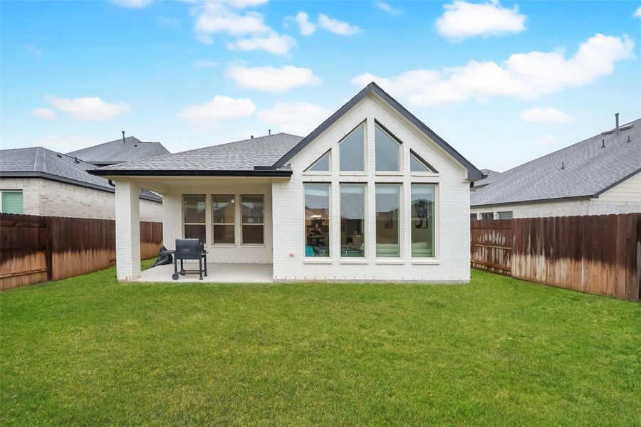 Exterior details and patio area of a home in Elyson, Katy (Image 25).