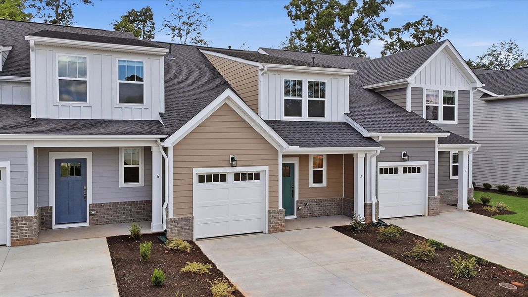 Front exterior of a new home in Pelham Crossing Villas, Greenville, SC, highlighting curb appeal (Image 24). Front exterior of a new home in Pelham Crossing Villas, Greenville, SC, highlighting curb appeal (Image 24).