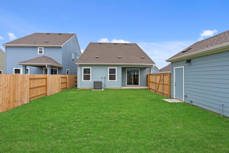 Rear of Home and Private Backyard