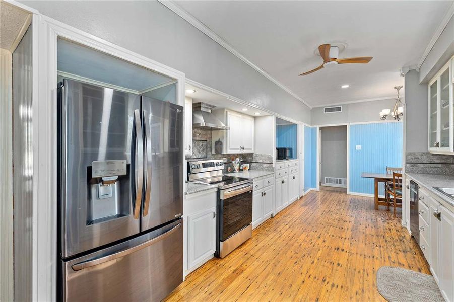 Kitchen with granite countertops and natural light