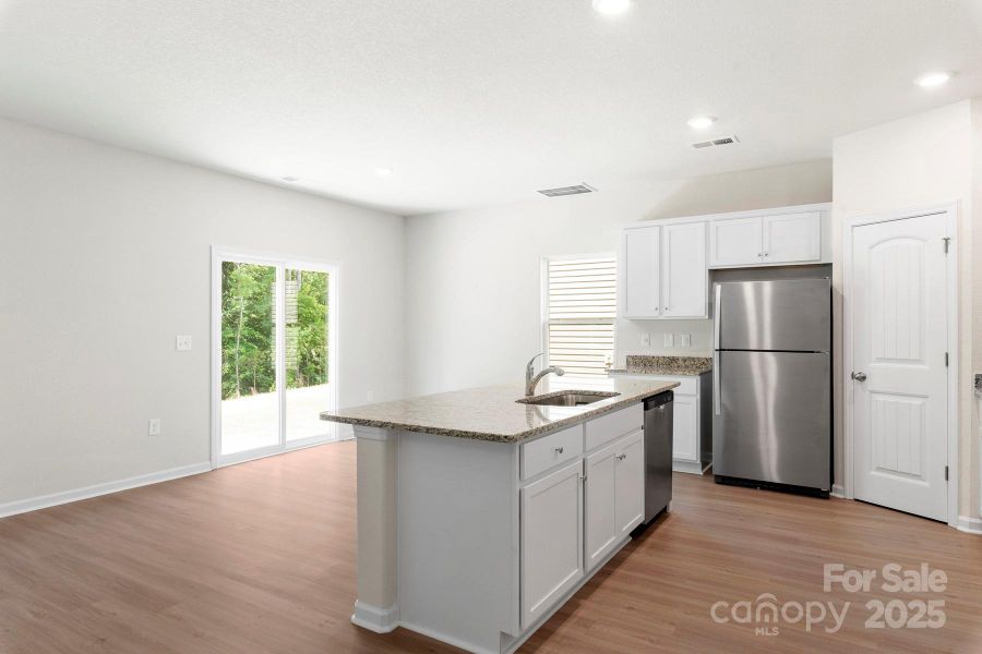 Furnished interior view inside a new home in Stagecoach Station, Gastonia (Image 7).