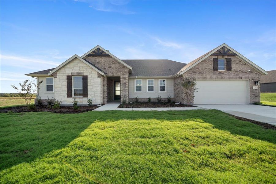 Front exterior of a new home in Fairview Meadows, New Fairview, TX, highlighting curb appeal (Image 2). Front exterior of a new home in Fairview Meadows, New Fairview, TX, highlighting curb appeal (Image 2).