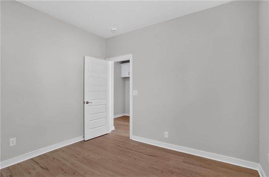 Spacious, unfurnished interior of a new home in The Cottages at East Lanier, Fayetteville (Image 8).