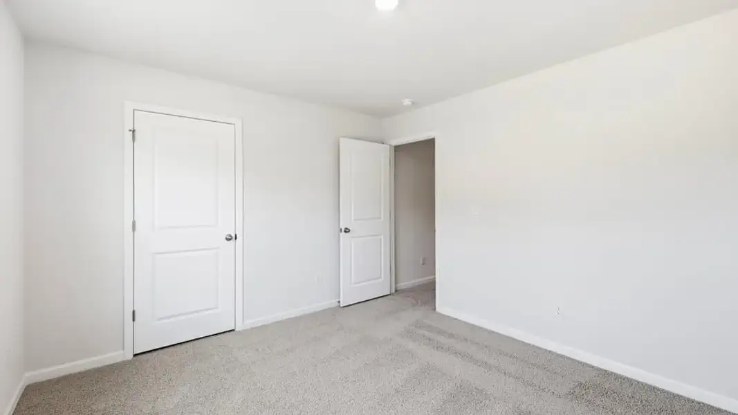 Spacious, unfurnished interior of a new home in Ben Hurt Road, Lyman (Image 29).