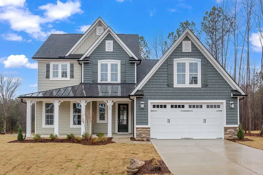 Representative exterior photo of a completed home built from the The Chandler by RobuckHomes in Baylee Ridge, Selma, NC (Image 30). Representative exterior photo of a completed home built from the The Chandler by RobuckHomes in Baylee Ridge, Selma, NC (Image 30).