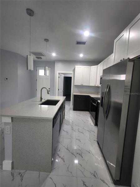 Furnished interior view inside a new home in , Port Charlotte (Image 12).