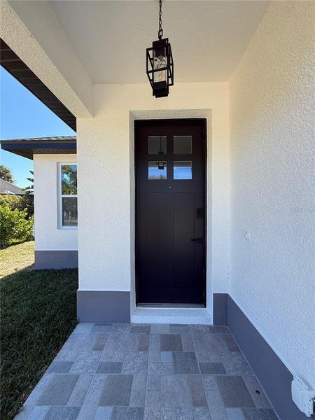 Exterior details and patio area of a home in , Rotonda West (Image 13).