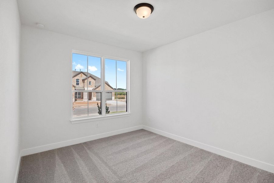 Spacious, unfurnished interior of a new home in Flora, Hutto (Image 18).