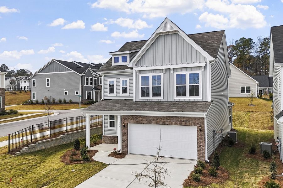 Front exterior of a new home in Renaissance at White Oak, Garner, NC, highlighting curb appeal (Image 18).