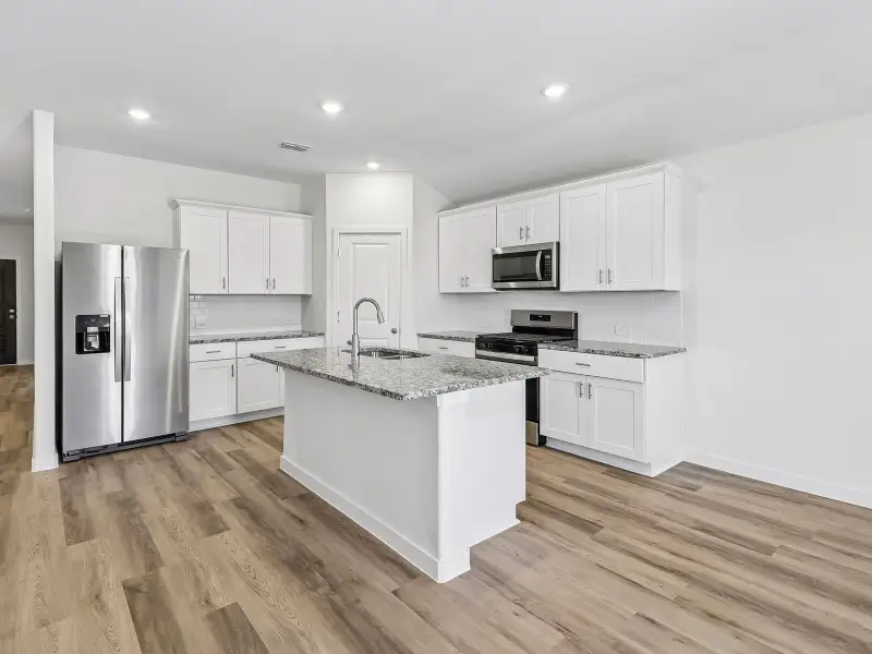 Furnished interior view inside a new home in Morgan Farms, Josephine (Image 6).