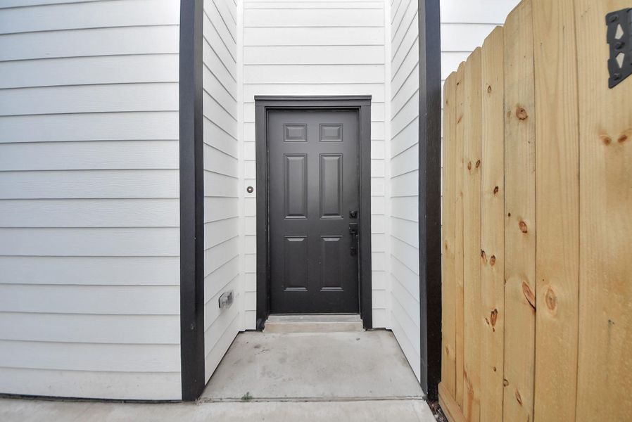 Exterior details and patio area of a home in , Houston (Image 3). Exterior details and patio area of a home in , Houston (Image 3).