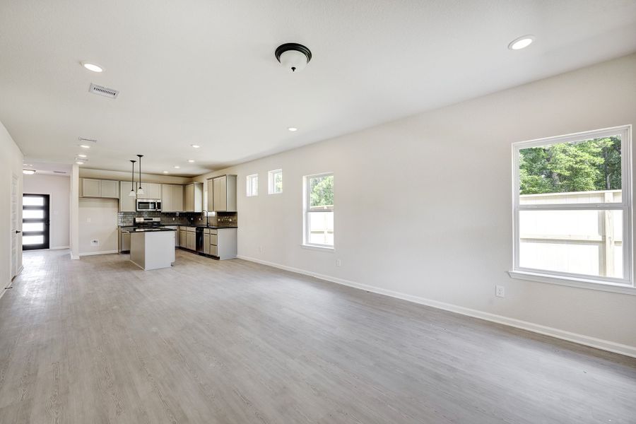 The Davenport II- Family Room into Dining Area and Kitchen