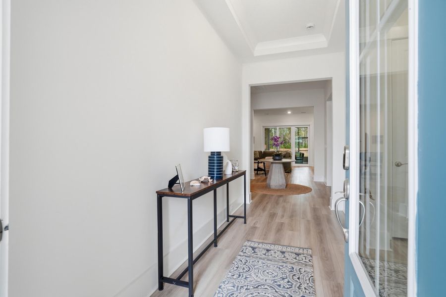 Furnished interior view inside a new home in Summerwind Crossing at Lakes of Cane Bay, Summerville (Image 5).