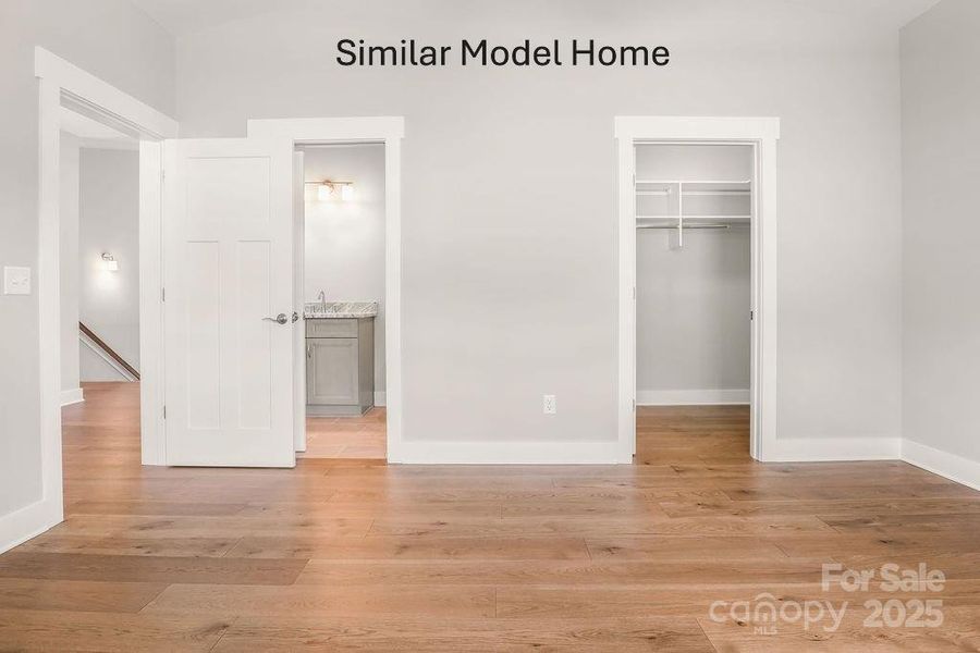 Secondary bedroom with full bathroom and walk-in closet Secondary bedroom with full bathroom and walk-in closet