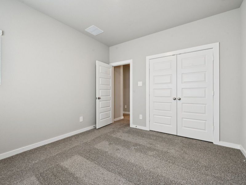 Spacious, unfurnished interior of a new home in Pinewood Trails - City Series, Atascocita (Image 22).