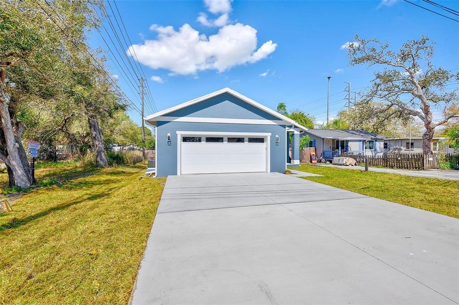 Front exterior of a new home in , St. Petersburg, FL, highlighting curb appeal (Image 23).