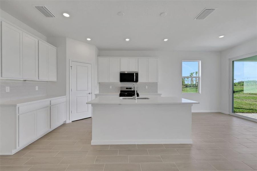 Furnished interior view inside a new home in Brystol North at Wylder, Port St. Lucie (Image 6).
