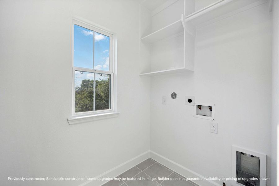 A laundry room you’ll actually want to use. Built-in shelving, hanging space, and even a window to make chores feel just a little lighter. A laundry room you’ll actually want to use. Built-in shelving, hanging space, and even a window to make chores feel just a little lighter.
