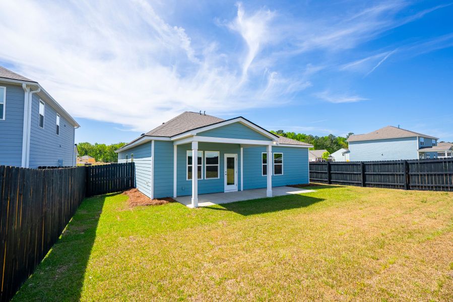 Exterior details and patio area of a home in Monroe Preserve, Chapin (Image 3).