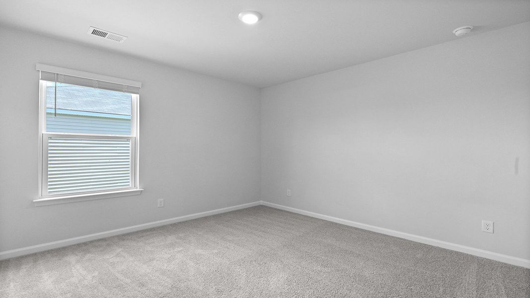 Spacious, unfurnished interior of a new home in Pine Hills at Cane Bay, Summerville (Image 25). Spacious, unfurnished interior of a new home in Pine Hills at Cane Bay, Summerville (Image 25).