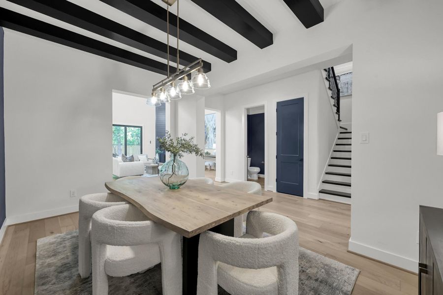 Extended dining view with sightlines to kitchen and living areas. Extended dining view with sightlines to kitchen and living areas.