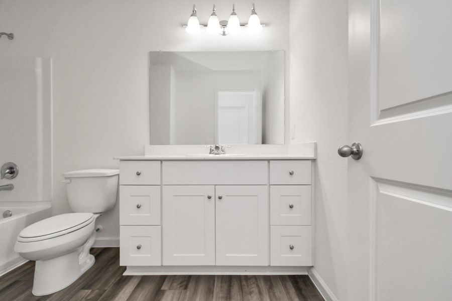 Furnished interior view inside a new home in Sunterra, Katy (Image 11).