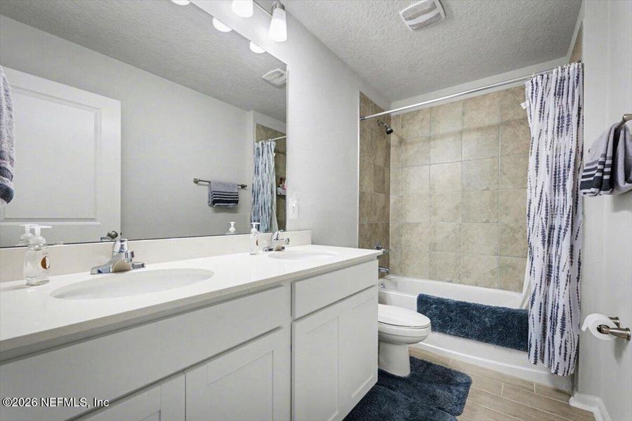 Furnished interior view inside a new home in Kings Landing, Jacksonville (Image 14).