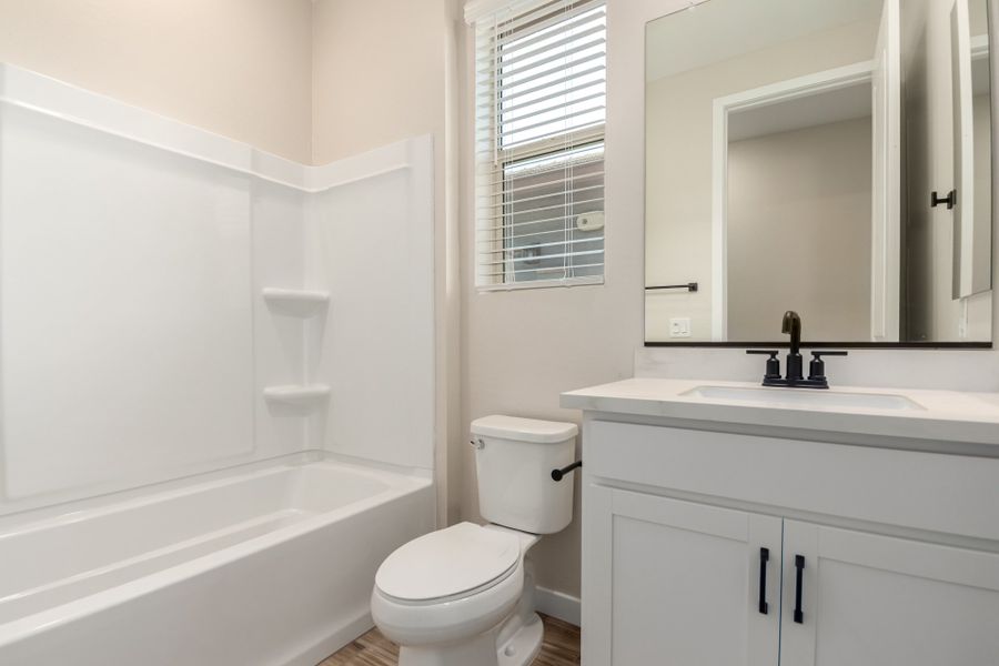 Furnished interior view inside a new home in Mira Vista at Victory, Buckeye (Image 12).