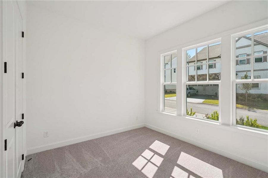 Spacious, unfurnished interior of a new home in East Harbor II at Chestatee, Dawsonville (Image 32).