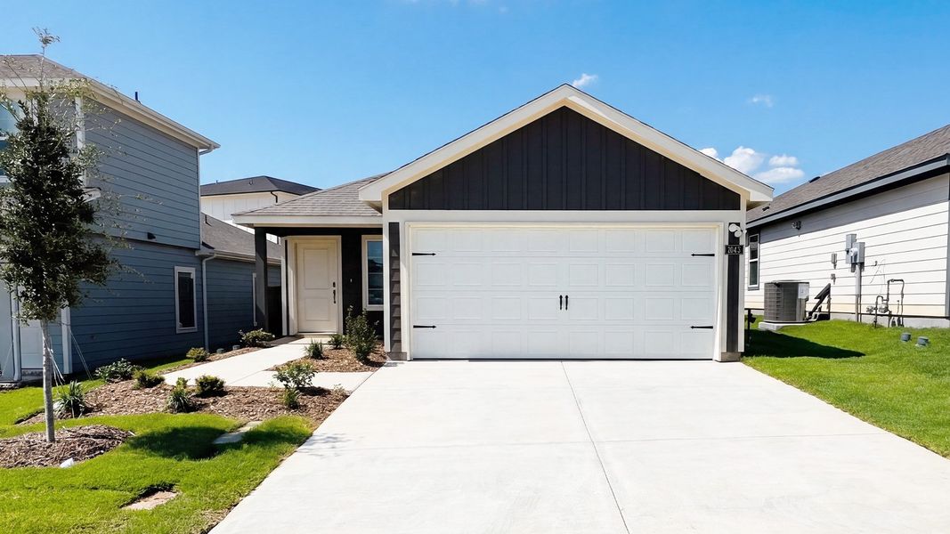Front exterior of a new home in Blaire Lake, Tyler, TX, highlighting curb appeal (Image 1). Front exterior of a new home in Blaire Lake, Tyler, TX, highlighting curb appeal (Image 1).