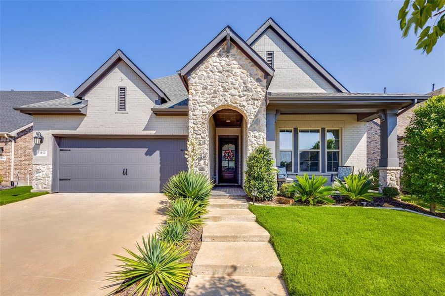 Front exterior of a new home in , Van Alstyne, TX, highlighting curb appeal (Image 24). Front exterior of a new home in , Van Alstyne, TX, highlighting curb appeal (Image 24).