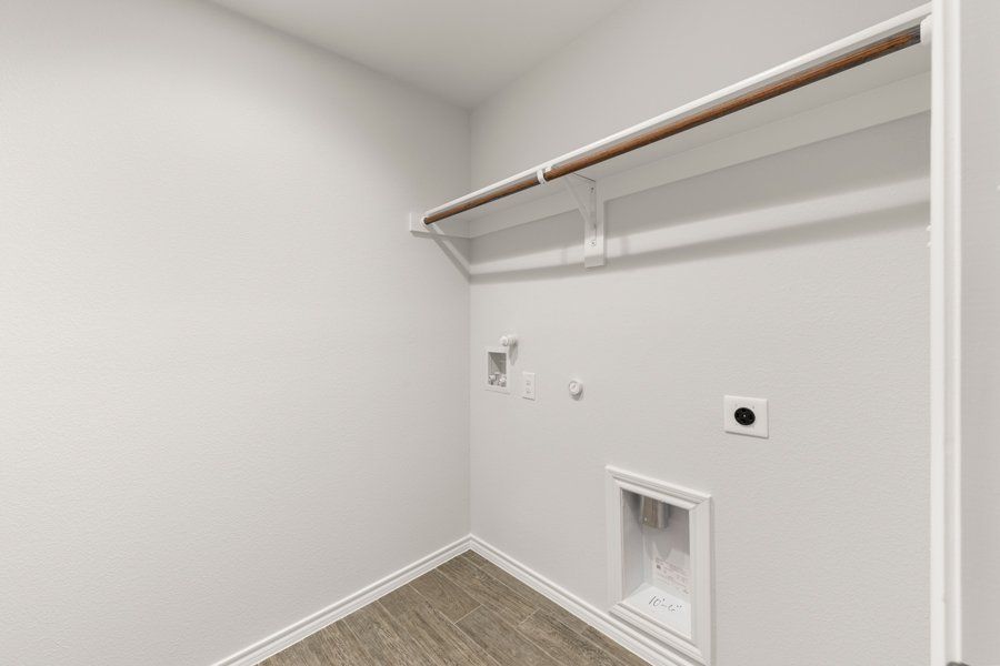 Representative exterior photo of a completed home built from the Cheyenne by Impression Homes in DeBerry Reserve, Royse City, TX (Image 24).