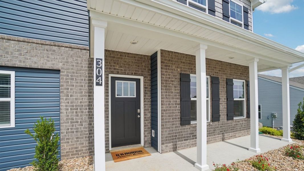 Exterior details and patio area of a home in Beechwood Meadows, Johnson City (Image 2).