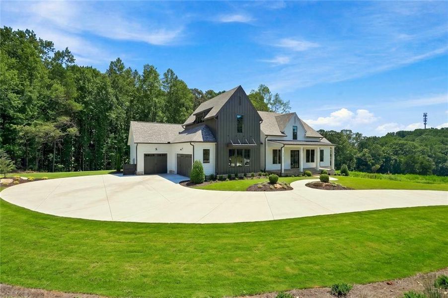 Front exterior of a new home in , Canton, GA, highlighting curb appeal (Image 34).