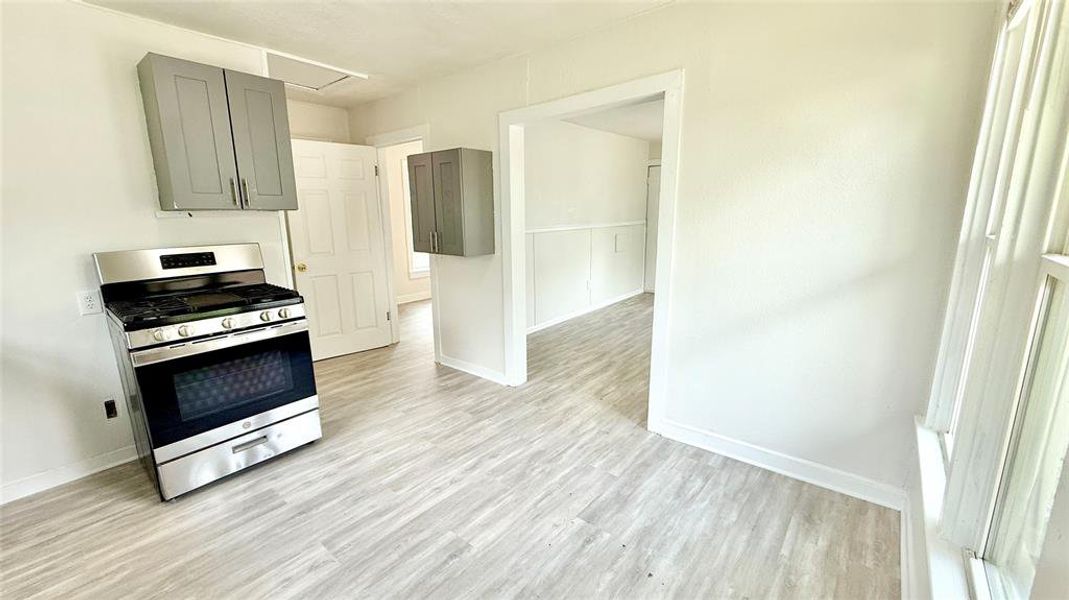 Kitchen from the backdoor looking towards living room and bedroom.