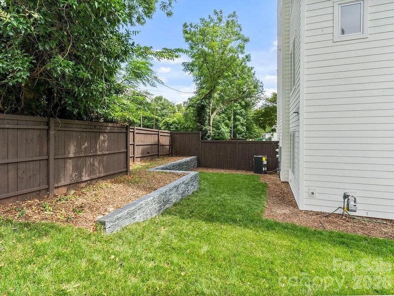 Exterior details and patio area of a home in , Charlotte (Image 3).