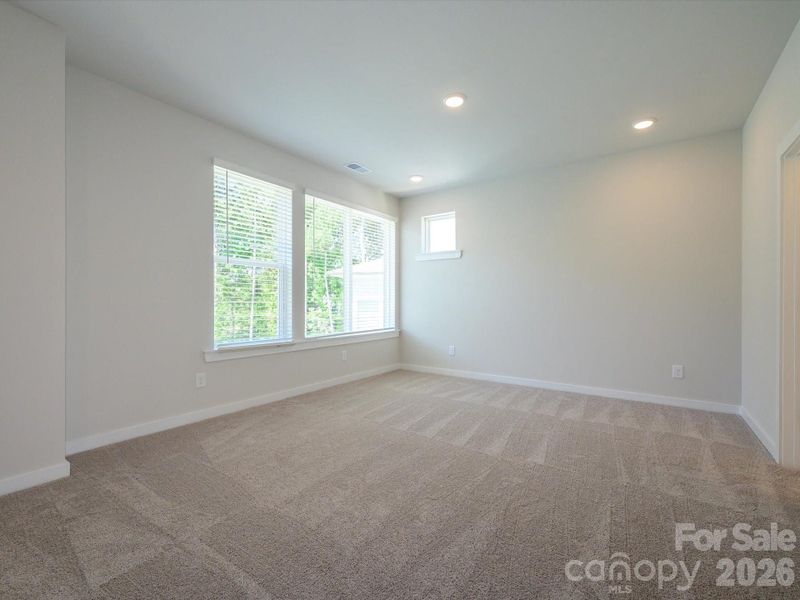 Spacious, unfurnished interior of a new home in Central Living at Craig, Charlotte (Image 24).