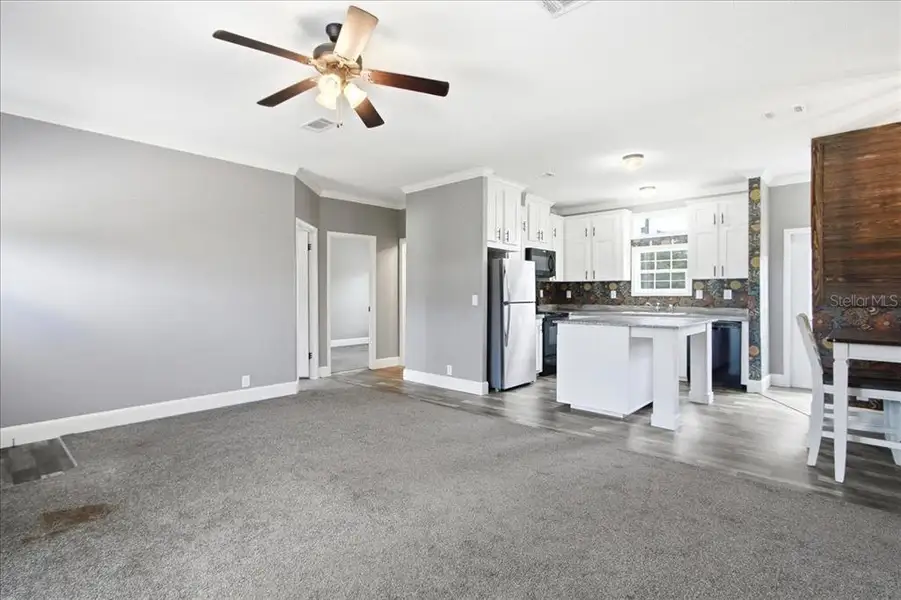 Spacious, unfurnished interior of a new home in , Bushnell (Image 26).