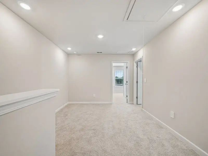 Spacious, unfurnished interior of a new home in Brooks Lake, Loganville (Image 9).