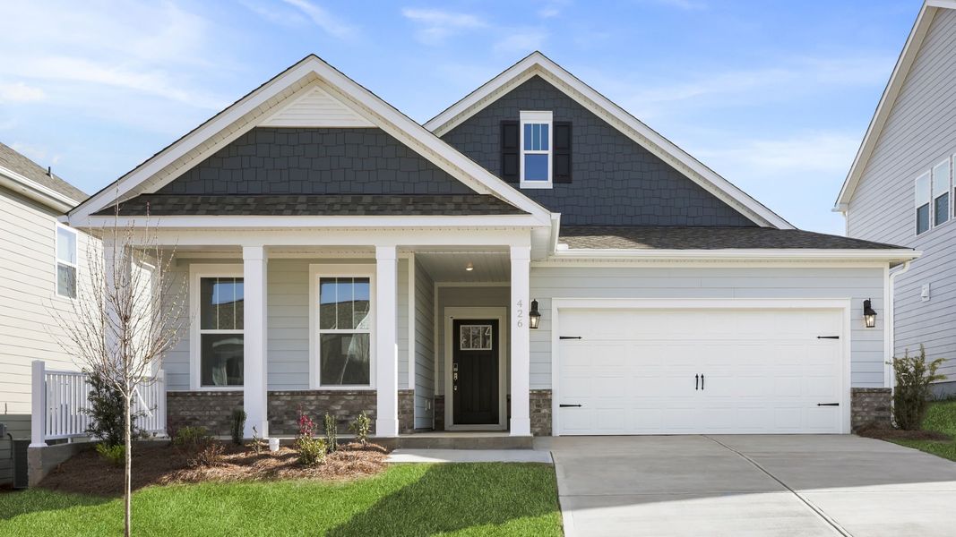 Front exterior of a new home in Adams Glen, Greenville, SC, highlighting curb appeal (Image 1). Front exterior of a new home in Adams Glen, Greenville, SC, highlighting curb appeal (Image 1).