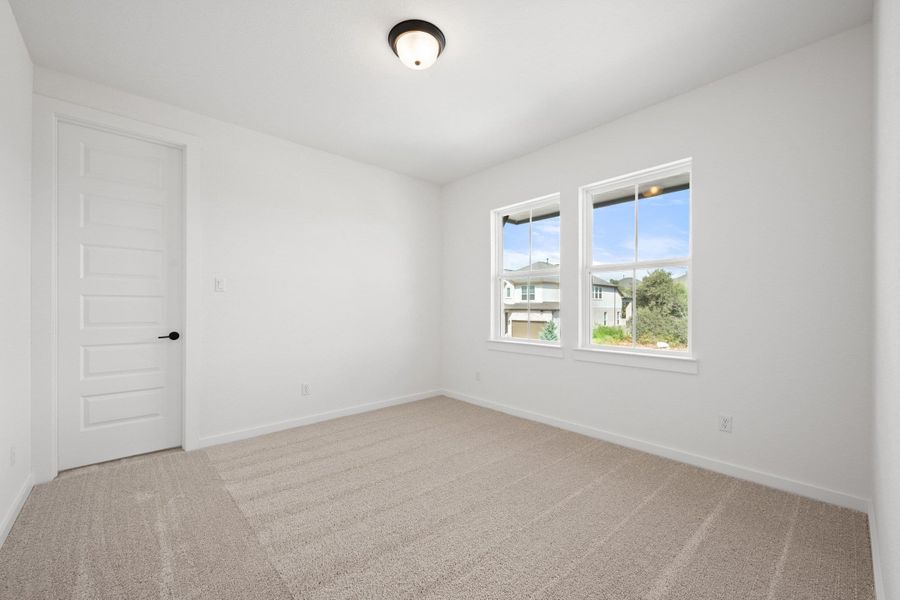 Spacious, unfurnished interior of a new home in Wolf Ranch, Georgetown (Image 43).