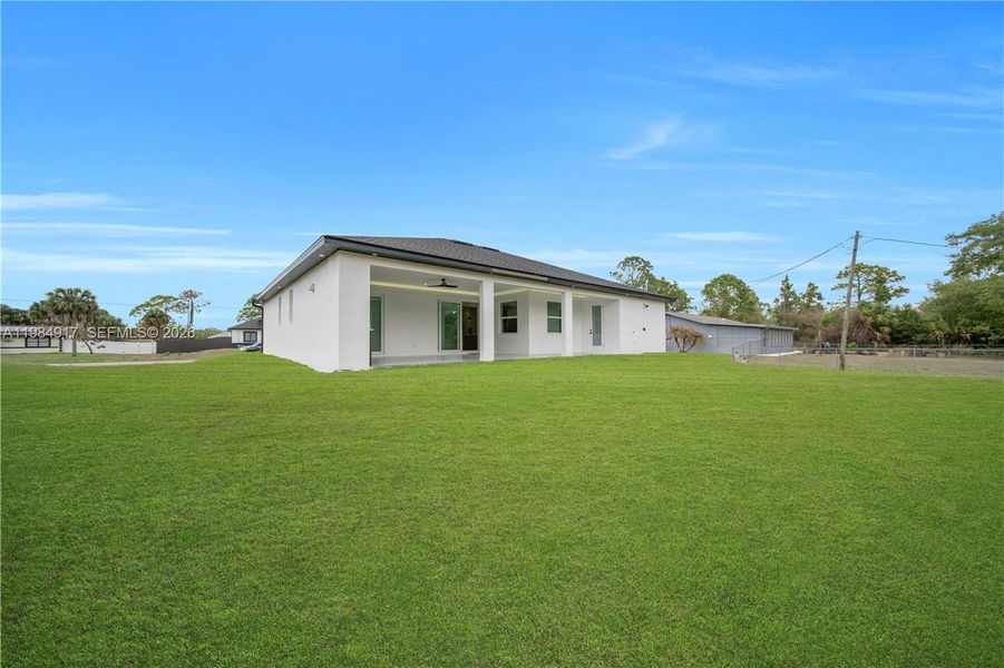 Exterior details and patio area of a home in , Lehigh Acres (Image 30). Exterior details and patio area of a home in , Lehigh Acres (Image 30).