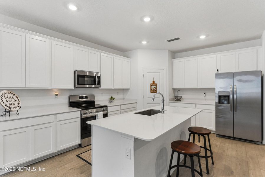 Furnished interior view inside a new home in Saddle Oaks, Jacksonville (Image 32).